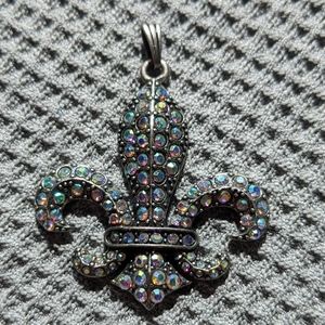 Crystal covered fleur de lis pendent